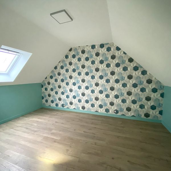 Réhabilitation d'une longère en habitation et extension pour un garage à Plounévez-Lochrist